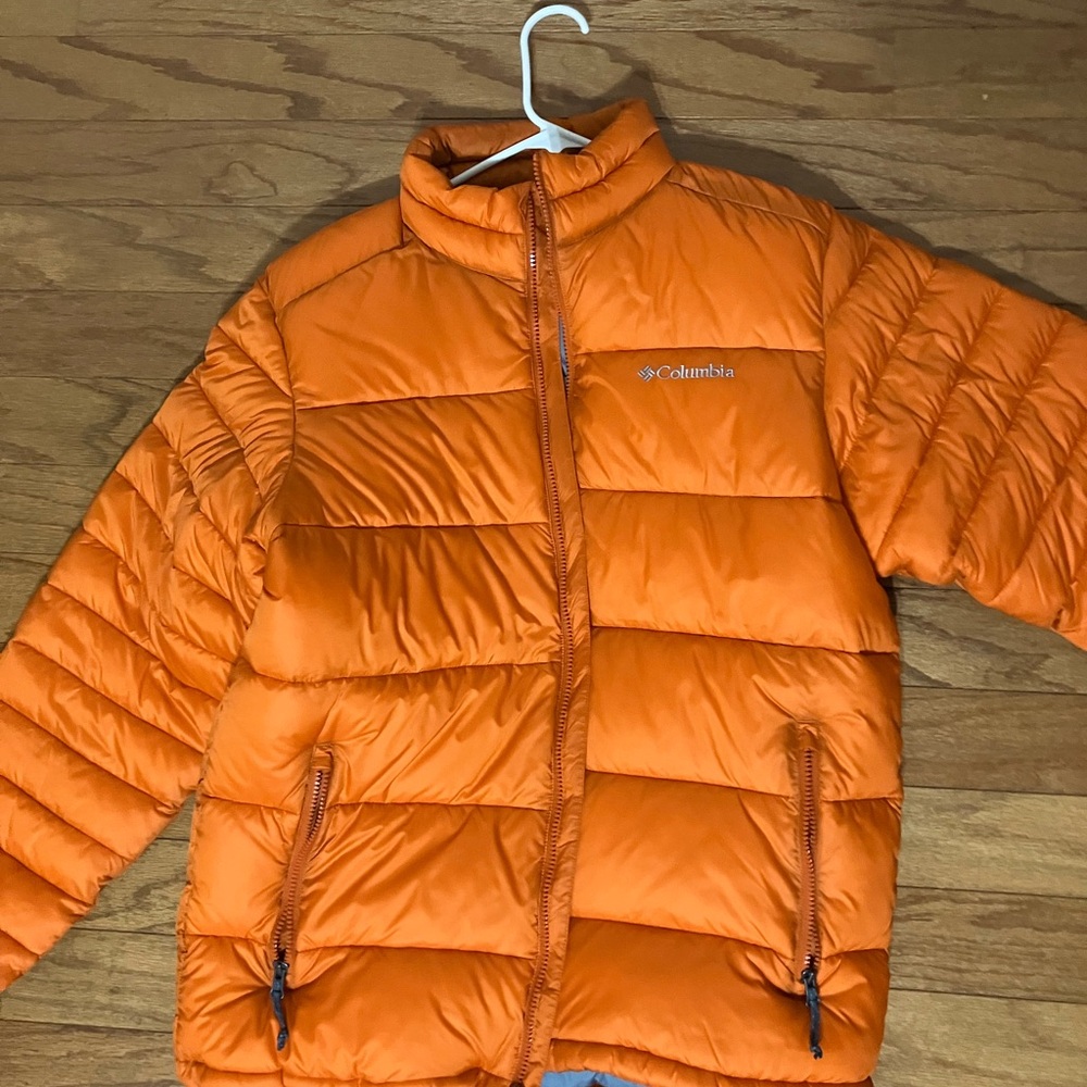 Columbia Orange Puffer Jacket with High Collar and Horizontal Quilting